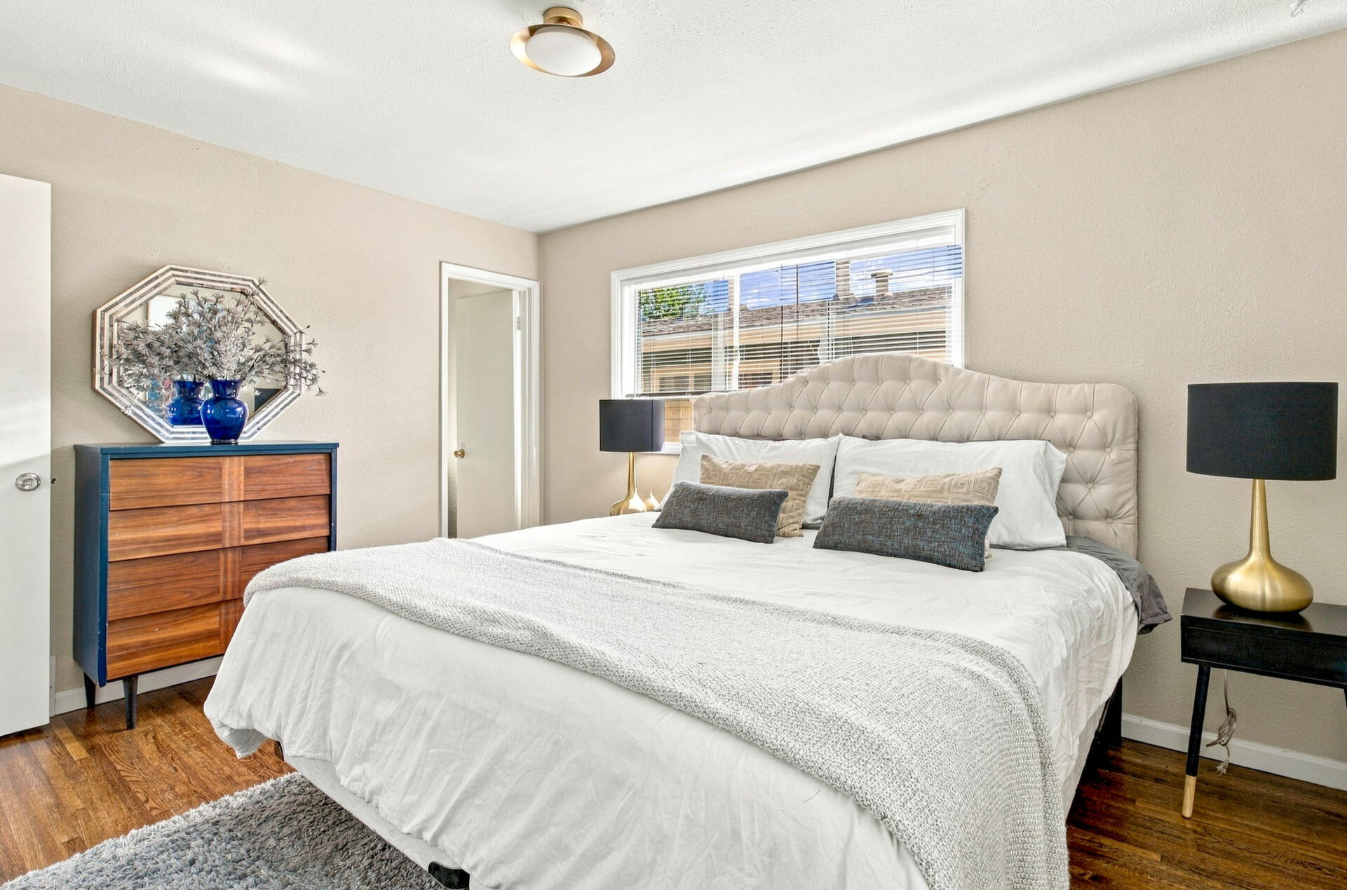 Bright furnished main-floor bedroom in Denver extended-stay home